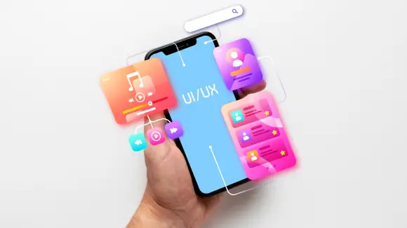 Professional web design services showcasing a mobile-responsive website layout held in hand.